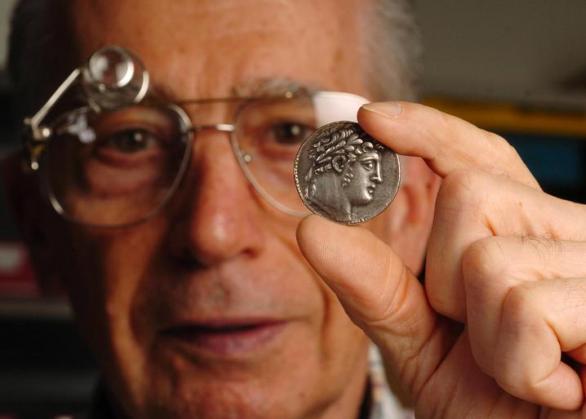 [Wayne Damron Holds an Ancient silver Shekel from Biblical Times]